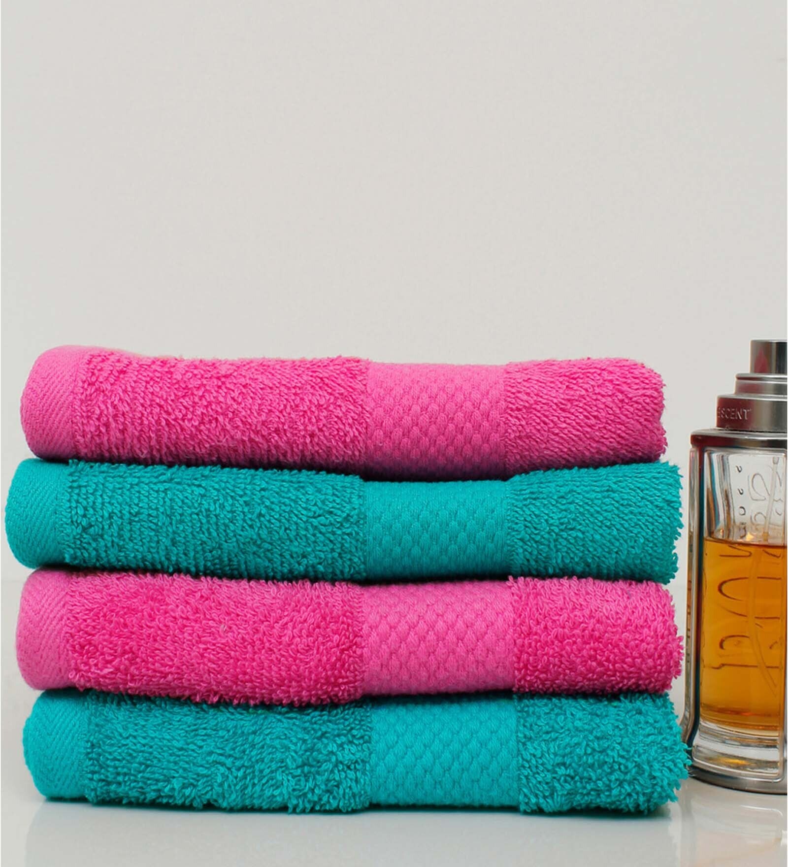 Buy Multicolor Solid 500 GSM 100 Cotton Hand Towels (Set of 4) by AVI
