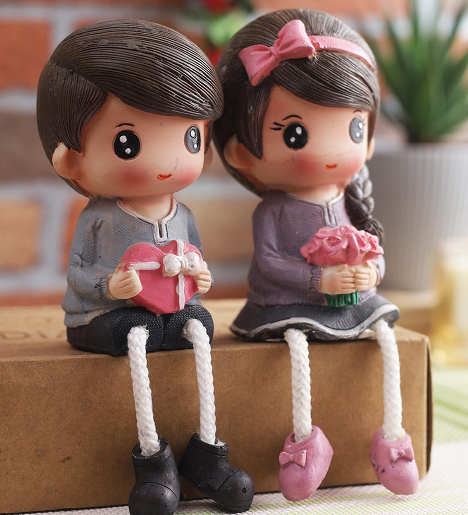 Buy Polyresin & Wooden Couple Miniature Showpiece at 29 OFF by