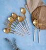 Radiant White Handle Gold Steel Cutlery Set of Twelve
