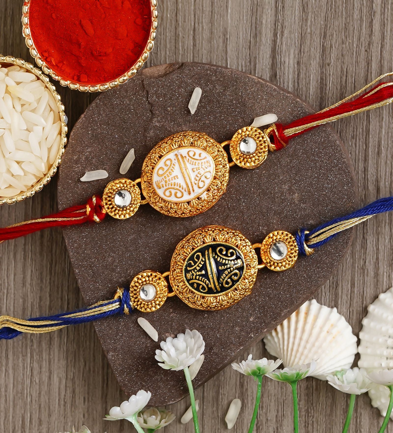 Buy Red & Blue Set of 2 Designer Kundan Rakhis with Roli Chawal Pack at ...
