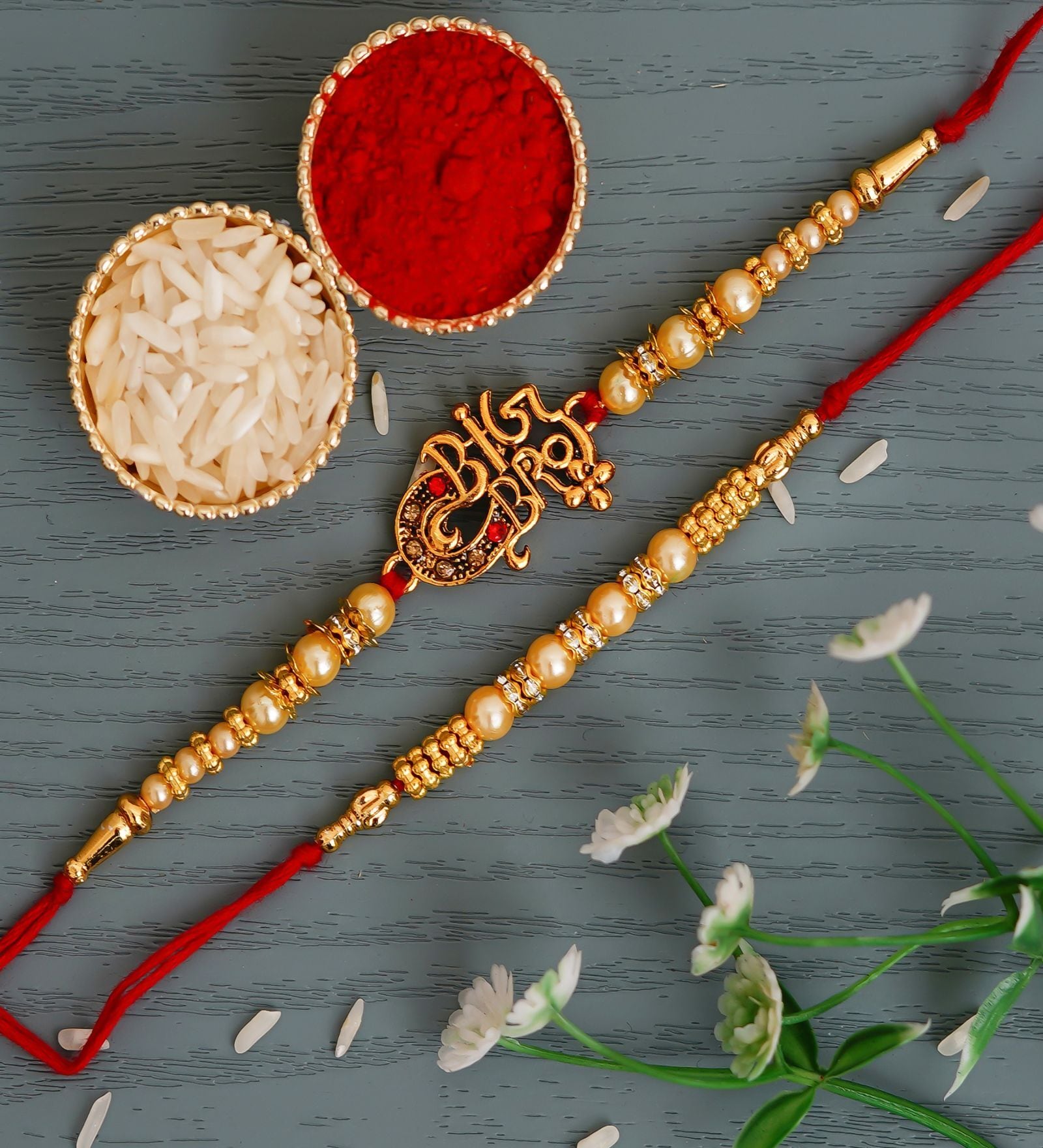 Buy Red & Golden Set of 2 Big Bro and Designer Pearl Rakhis with Roli ...