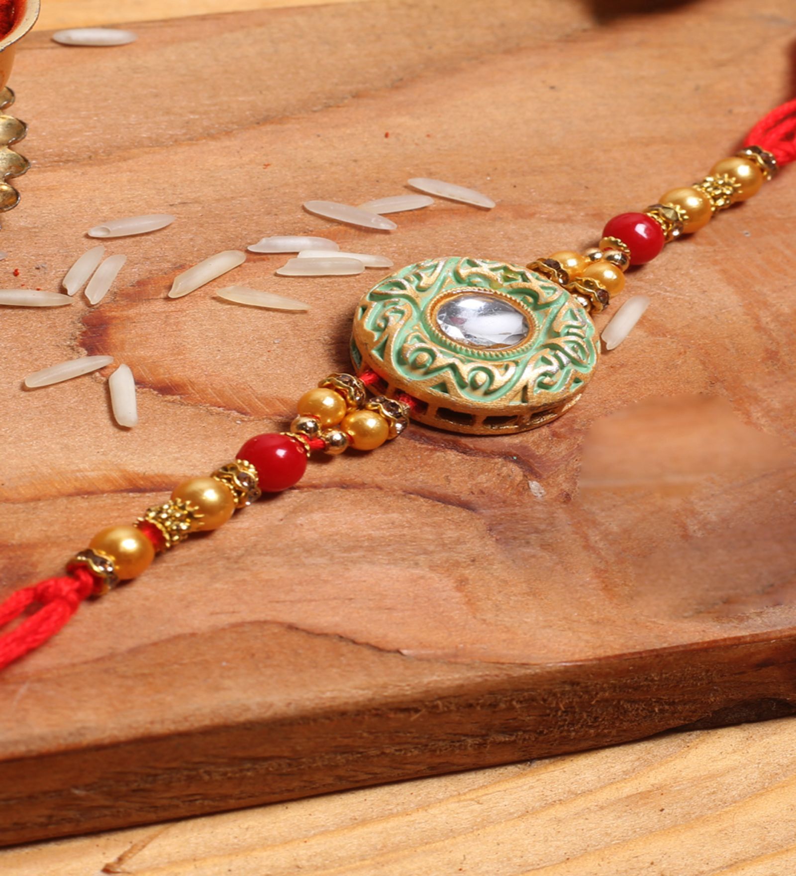Red Thread & Plastic Rakhi Set