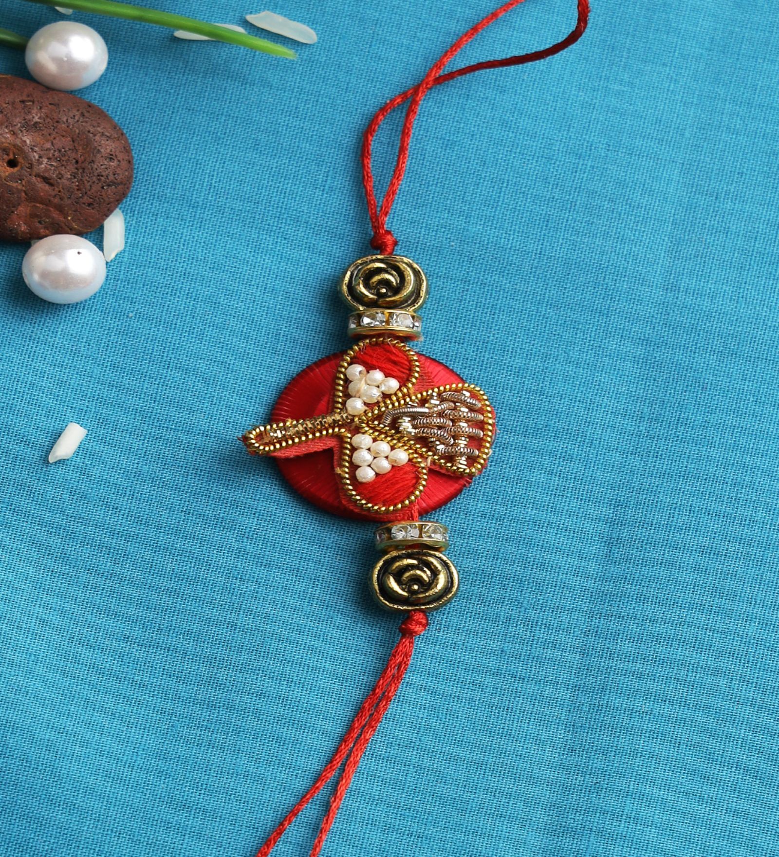 Red Thread & Plastic Rakhi Set