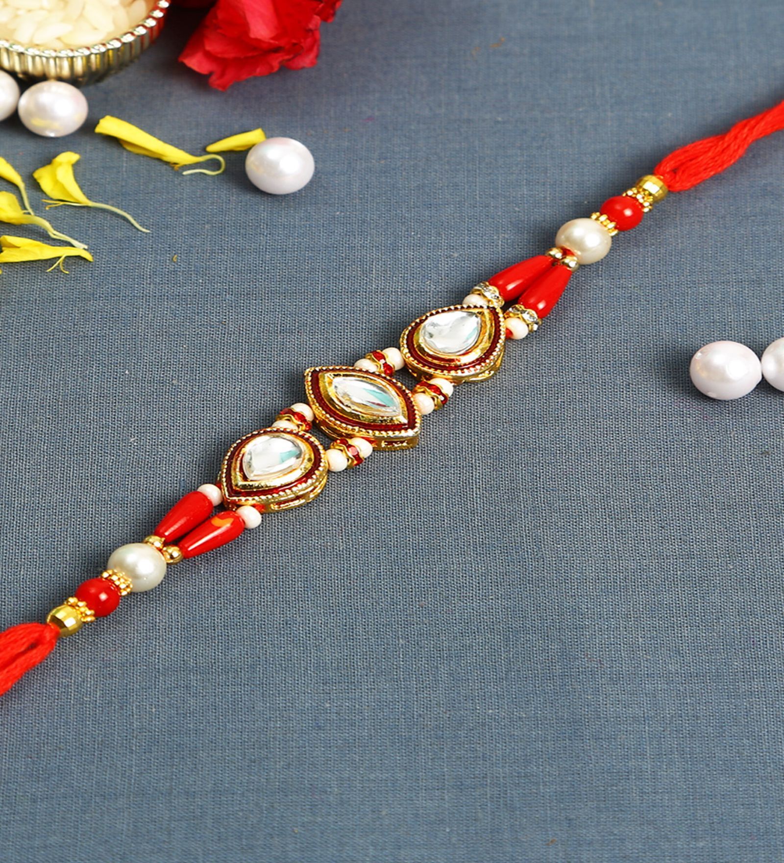 Red Thread & Plastic Rakhi Set