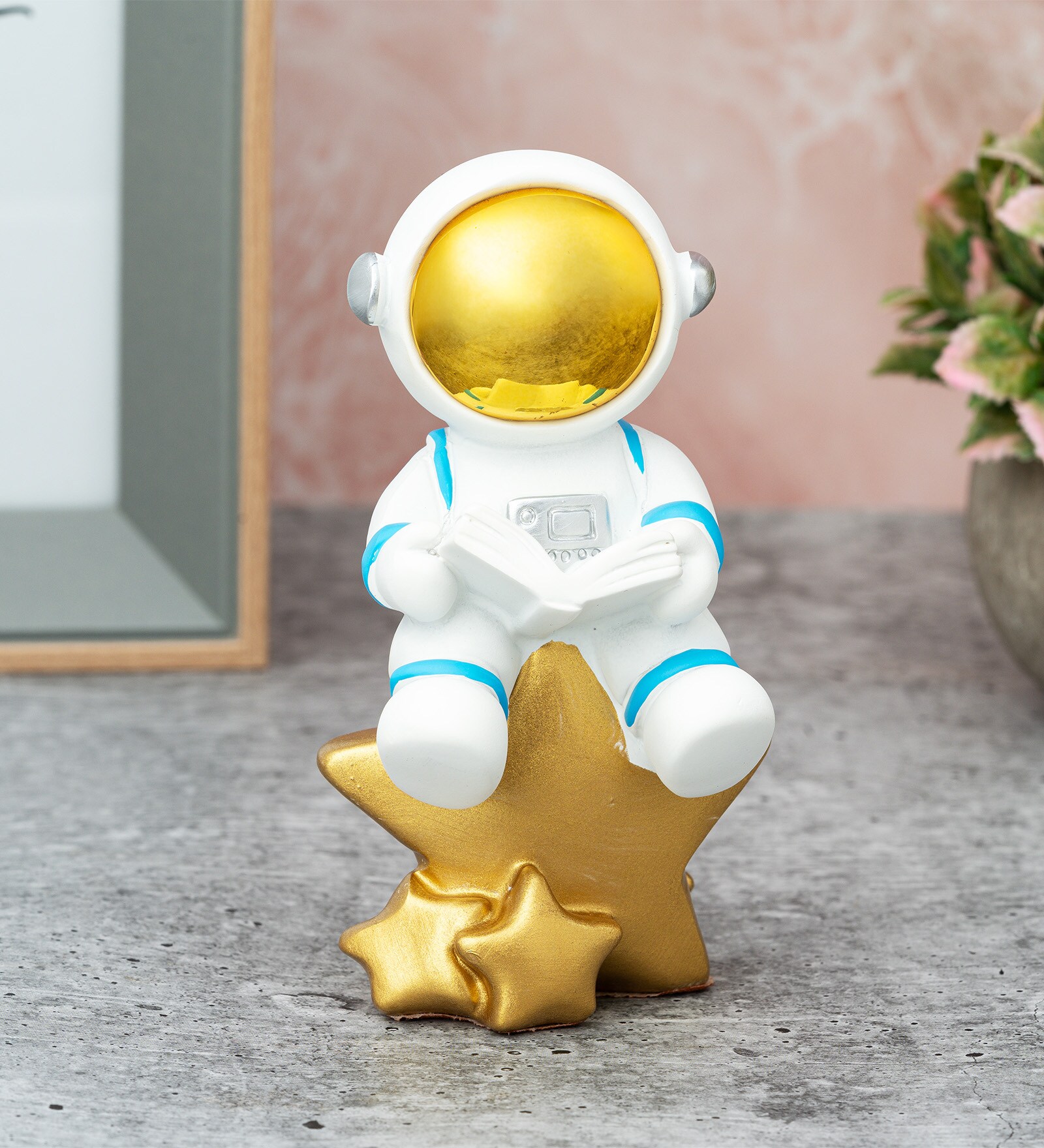 White Resin Astronaut On Star Showpiece