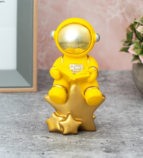 Yellow Resin Astronaut On Star Showpiece