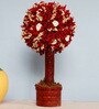 Red Bonsai Tree With Sola Flowers On A Wooden Base