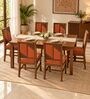 Rekha 6 Seater Dining Set In Provincial Teak Finish With Terracotta Orange Colour Chair Rekha 6 Seater Dining Set In Provincial Teak Finish With Terracotta Orange Colour Chair