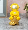 Yellow Resin Astronaut On Star Showpiece