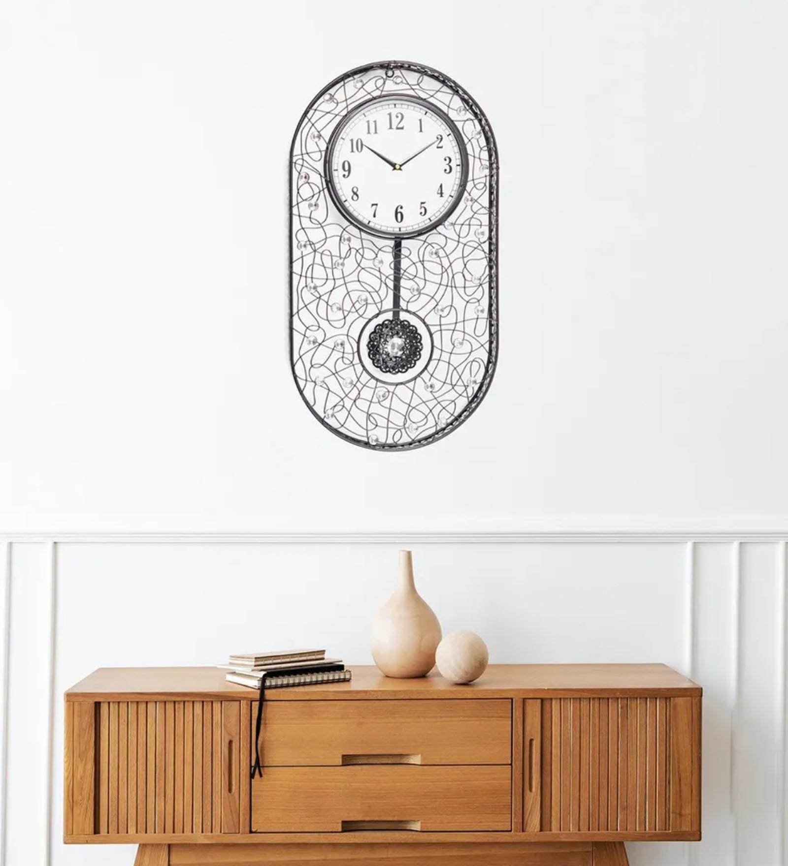 Rhythm Oval Metal & Glass Pendulum Wall Clock