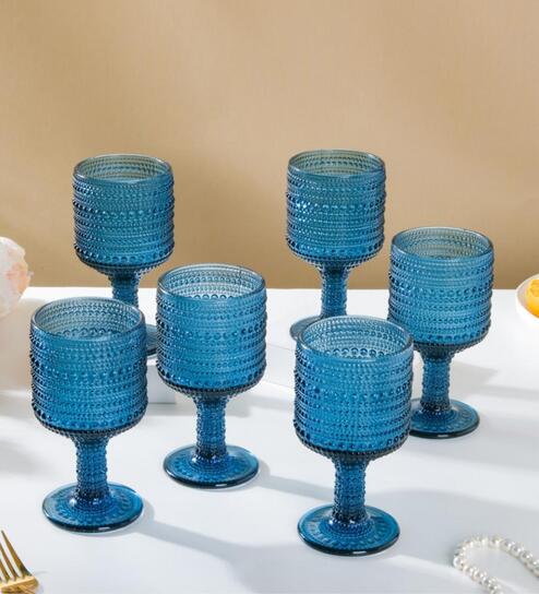 https://ii1.pepperfry.com/media/catalog/product/r/i/494x544/ribbed-zesty-250ml-blue-crystal-glass--set-of-6--flute-champagne-glass-ribbed-zesty-250ml-blue-cryst-fxpxce.jpg