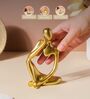 Right Hand Thinking Human Golden Artisanal Resin Sculpture Showpiece