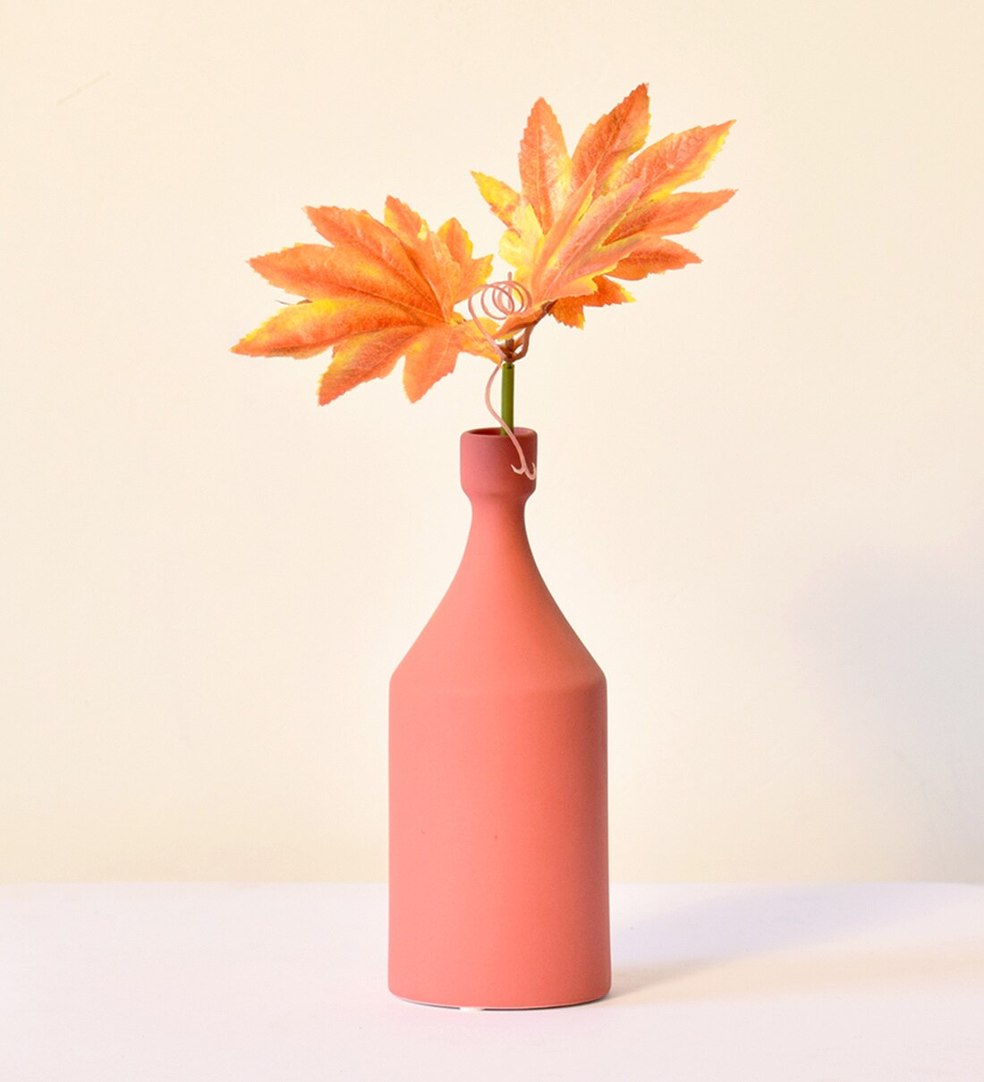 Buy Round Bottle Nathan Ceramic Table Vase at 38% OFF by Morcee | Pepperfry