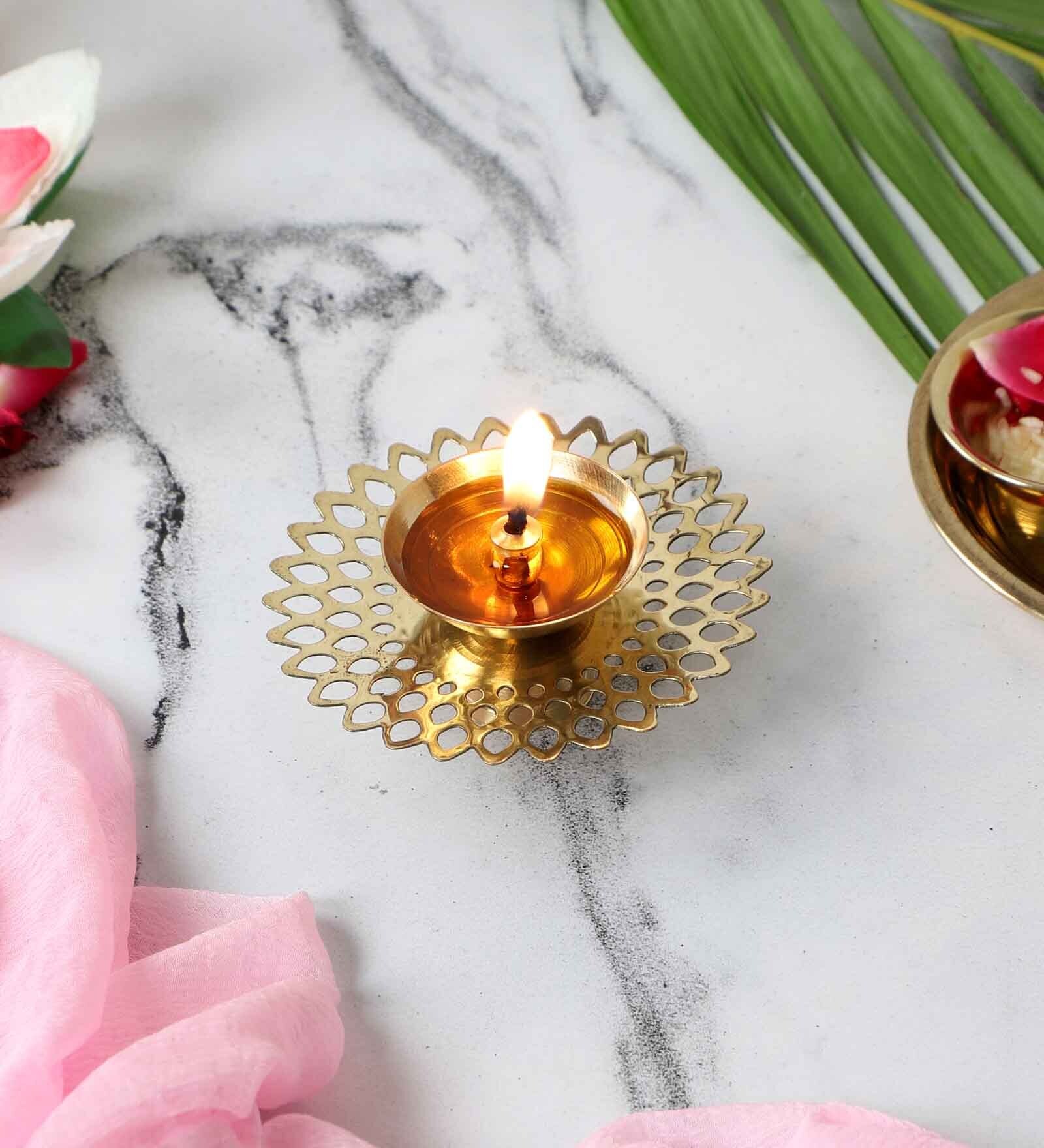 Buy Round Etching Gold Brass Diya at 21% OFF by Amaya Decors | Pepperfry