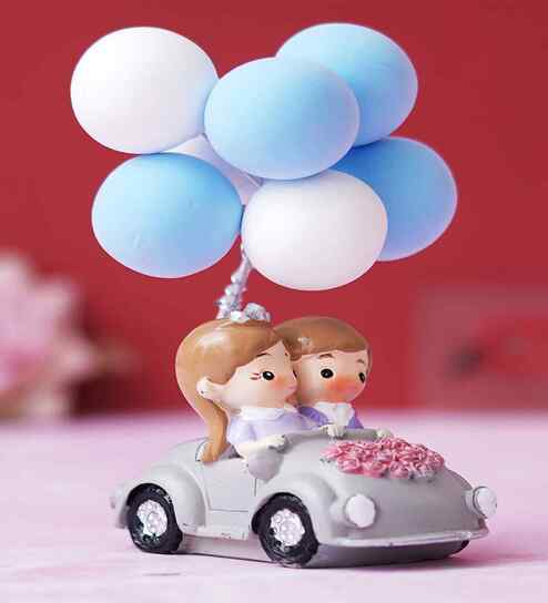Romantic Couple with Balloon Multicolour Polyresin Showpieces
