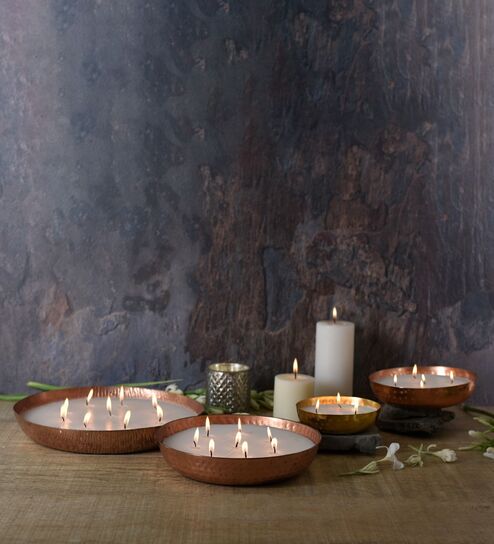 Roshni Brown & Gold Iron (Set of 4)
Scented Wax Filled Urli
Candle