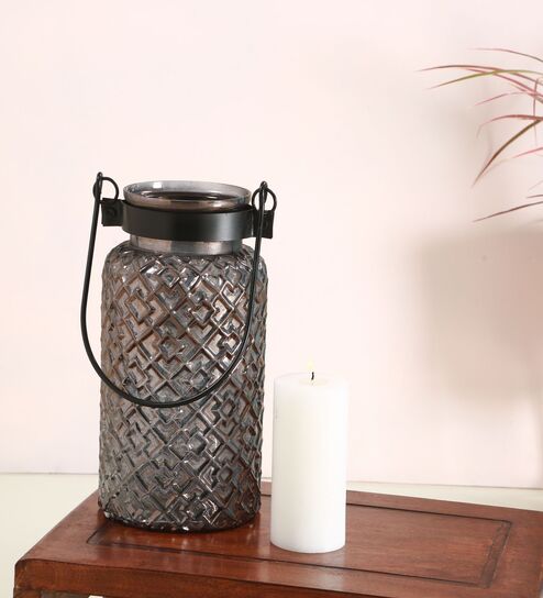 Roshni
Patterned 12 Inch Black Glass & Iron Candle
Holder