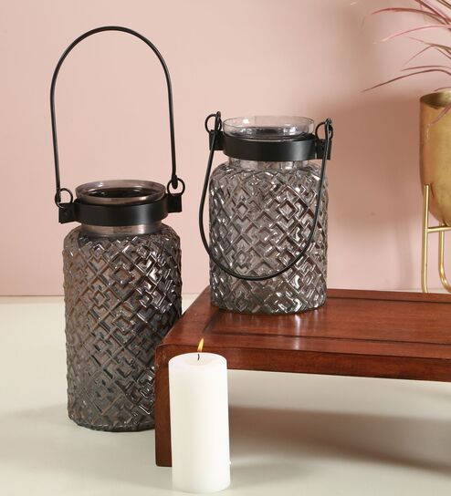 Roshni
Patterned 9.5 Inch Black Glass & Iron Candle
Holder