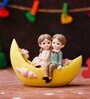 Couple Showpiece Sitting On Boat Valentine Gift