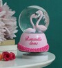 Romantic Love Couple Pink Rotating Snow Globe with Music Polyresin & Glass Showpiece
