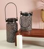 Roshni
Patterned 9.5 Inch Black Glass & Iron Candle
Holder