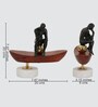 Thinking Man On Boat Sculpture  Wood , Aluminium & Stone  Gold Plated Metal