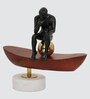 Thinking Man On Boat Sculpture  Wood , Aluminium & Stone  Gold Plated Metal