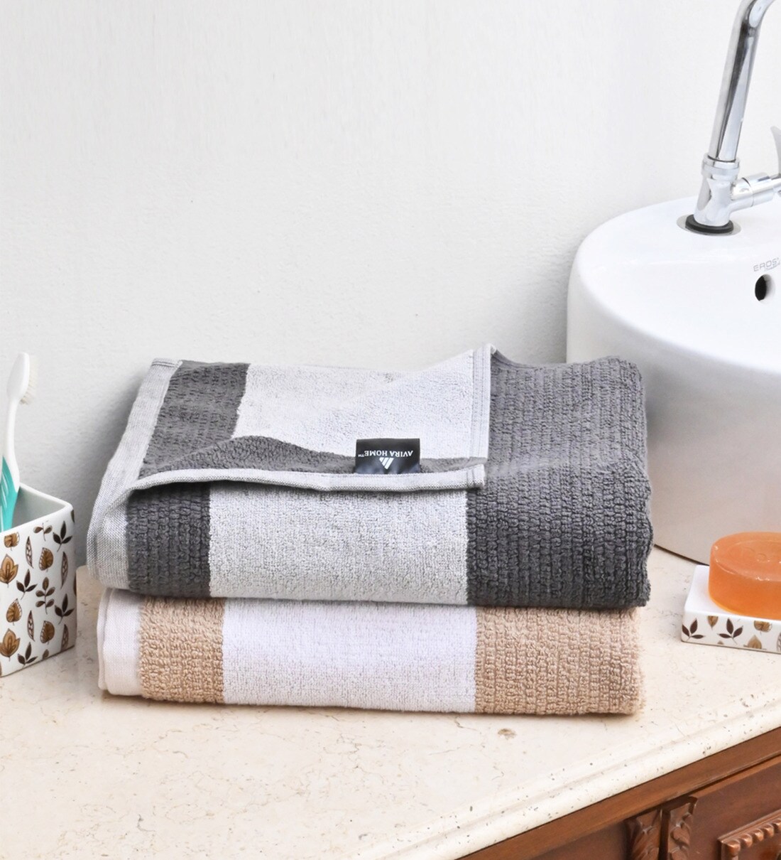 black and beige towels