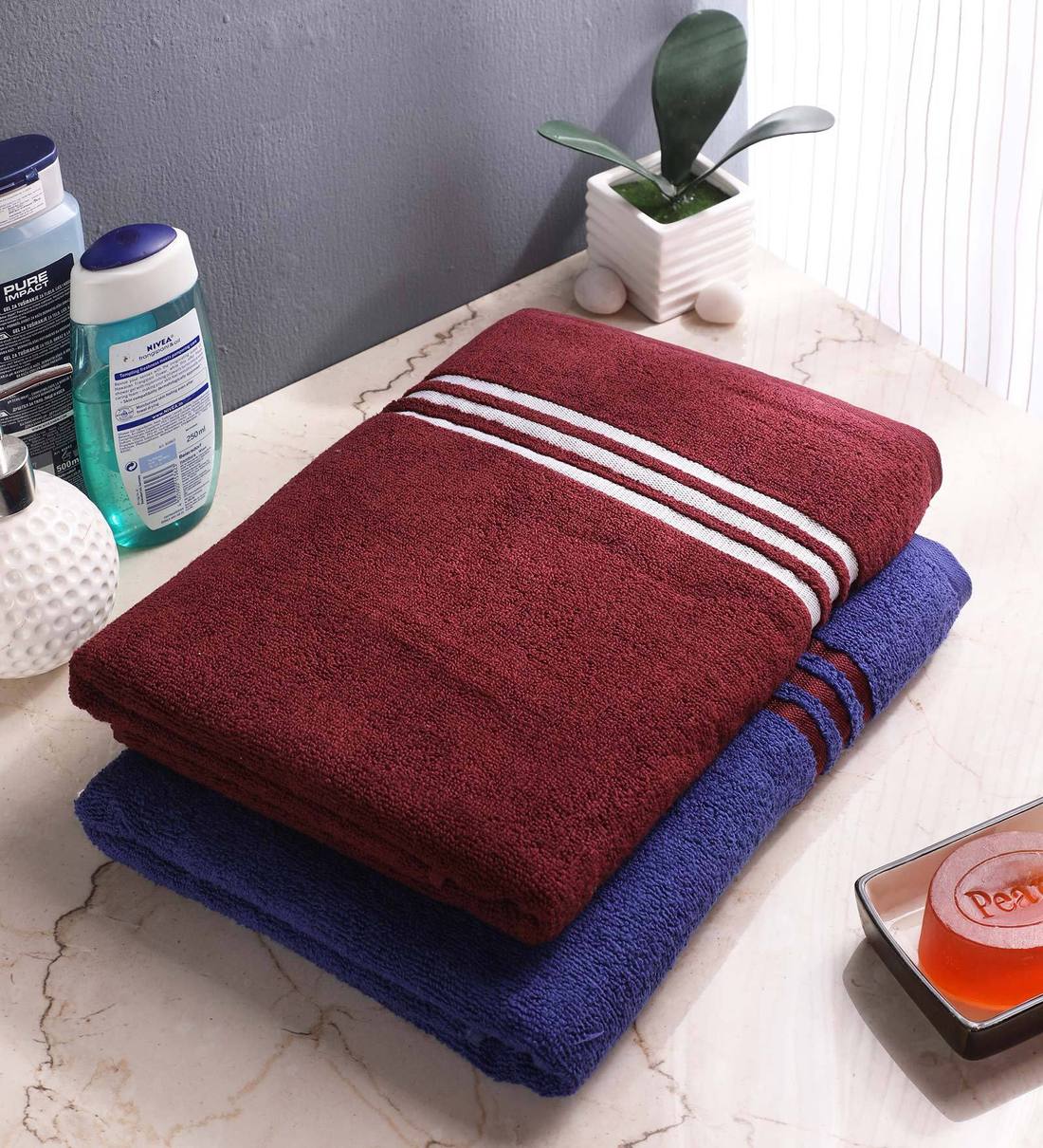 blue and brown bath towels