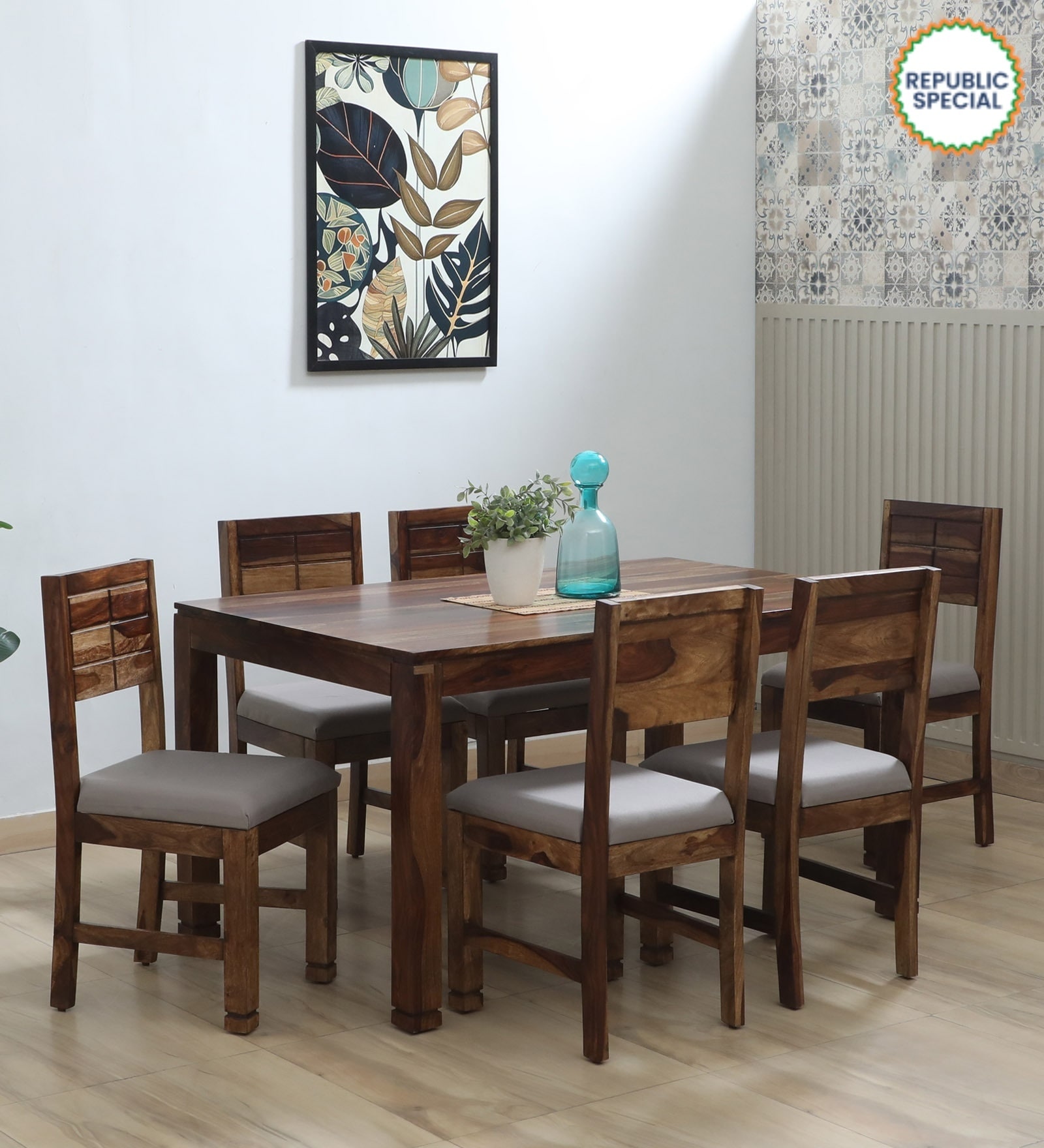 Segur Sheesham Wood 6 Seater Dining Set in Scratch Resistant Provincial Teak Finish with Grey Cushion Segur Sheesham Wood 6 Seater Dining Set in Scratch Resistant Provincial Teak Finish with Grey Cushion