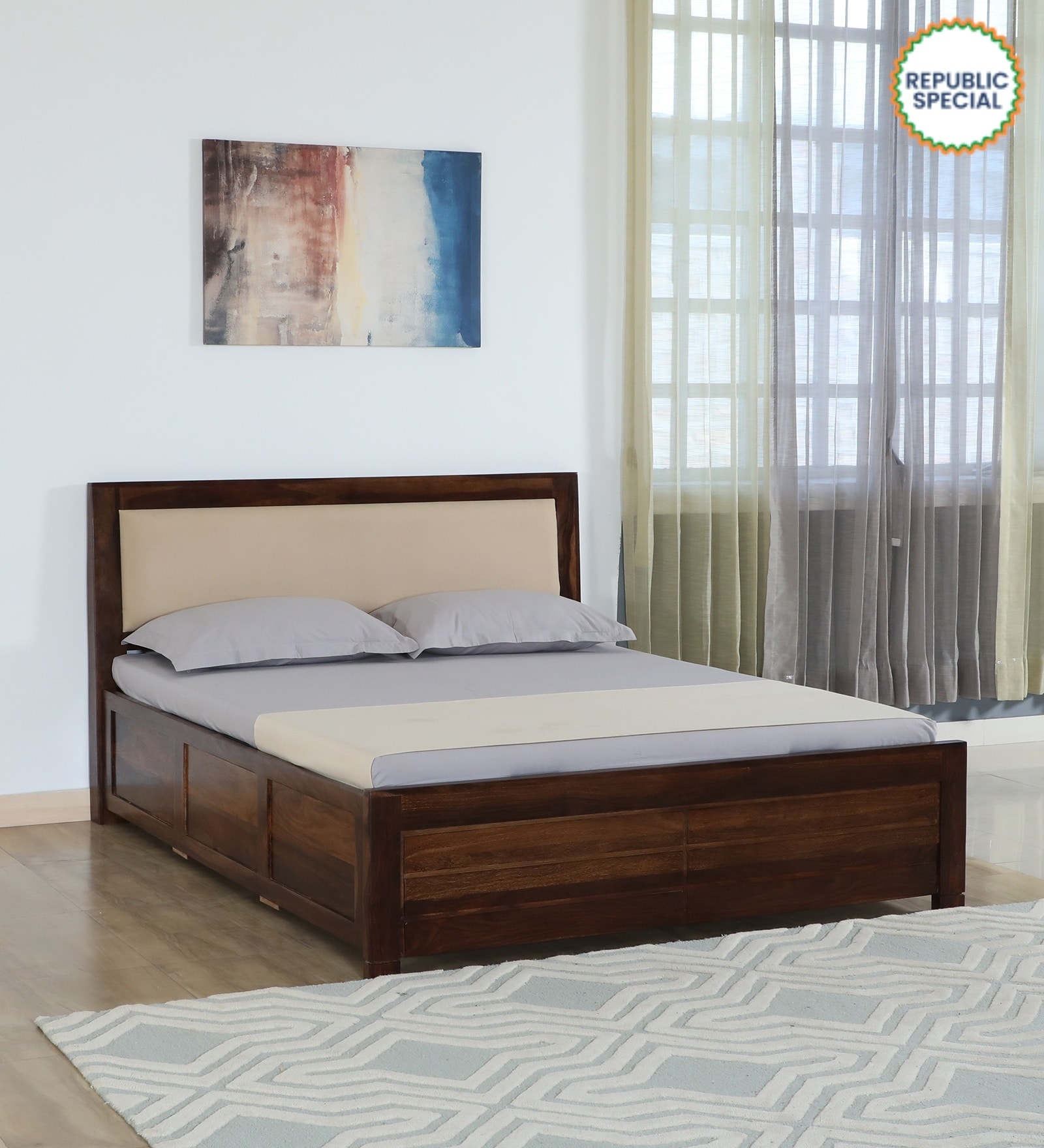 Segur Sheesham Wood Queen Size Bed In Provincial Teak Finish With Beige Padded Headboard Hydraulic Storage