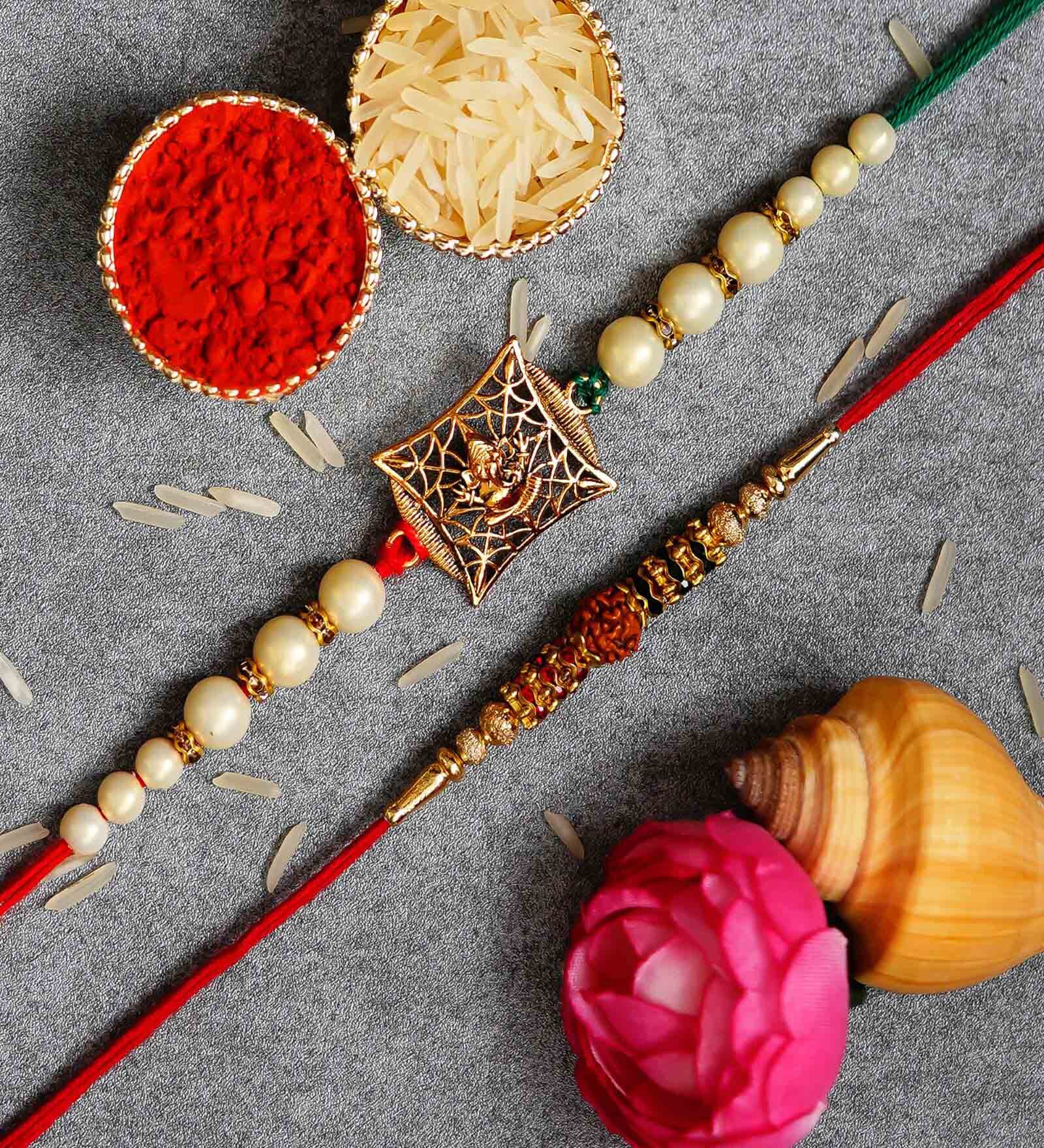Buy Set of 2 Lord Ganesha and Rudraksha Designer Religious Rakhis with ...