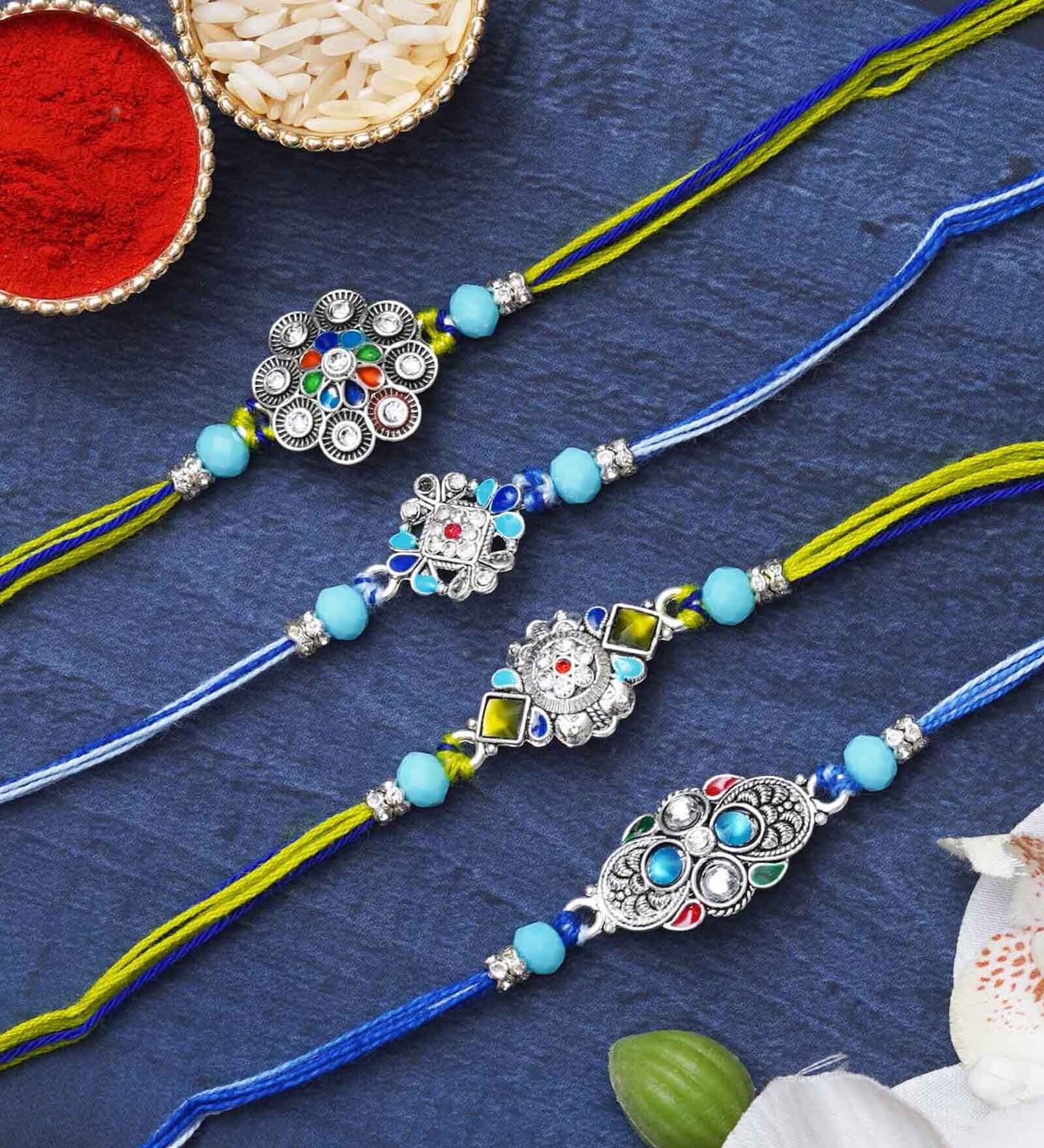 Buy Set of 4 Designer Rakhi & Roli Chawal Pack at 38% OFF by ...