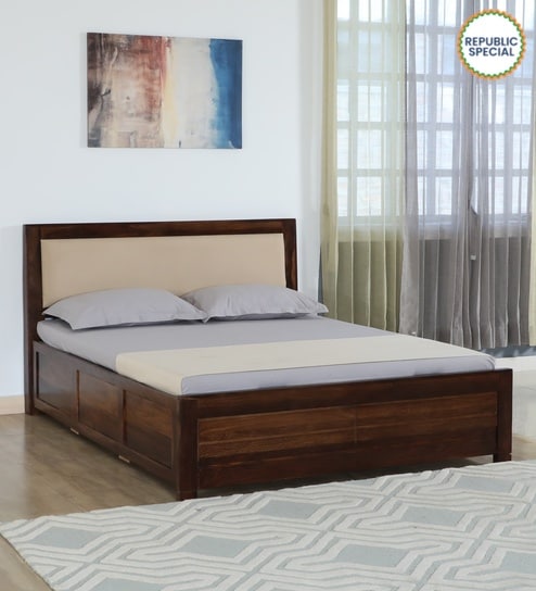 Segur Sheesham Wood King Size Bed In Provincial Teak Finish With Beige Padded Headboard Hydraulic Storage