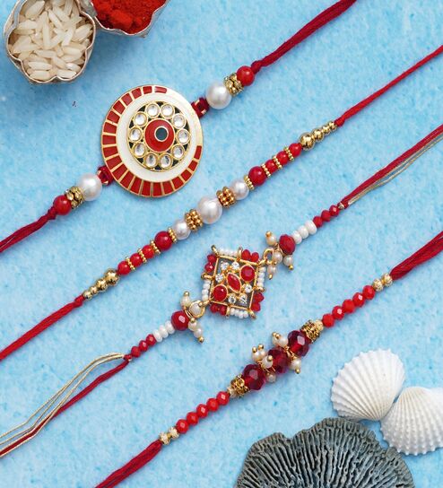 Set of 4 Red, White, Golden Beads, Pearls, Designer Rakhis with Roli Chawal Pack