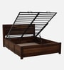 Segur Sheesham Wood King Size Bed In Provincial Teak Finish With Hydraulic Storage