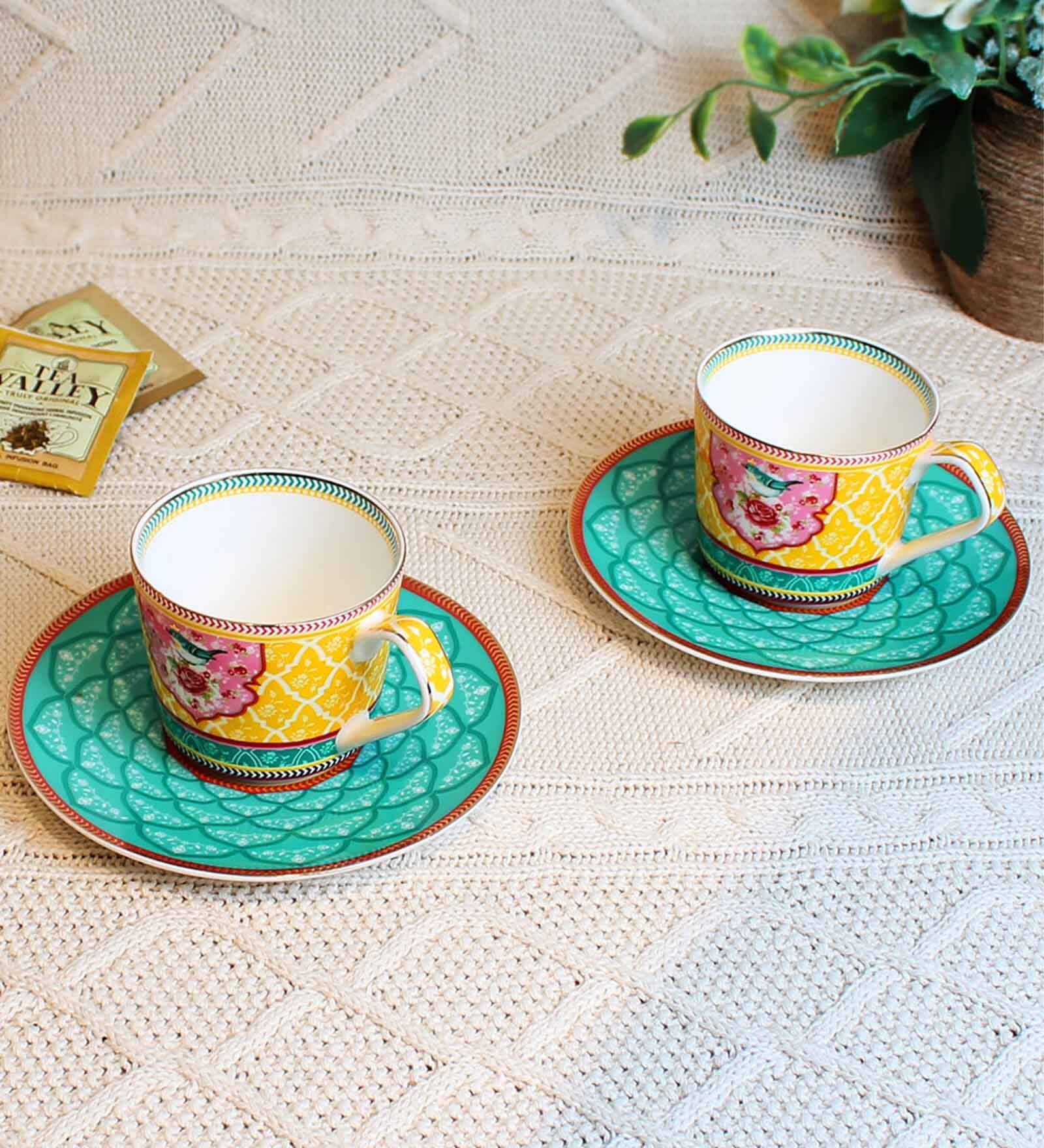 Izzhaar Signature 200ml Green& Yellow ceramic (Set of 2) Tea Cup & Saucer Set Izzhaar Signature 200ml Green& Yellow ceramic (Set of 2) Tea Cup & Saucer Set