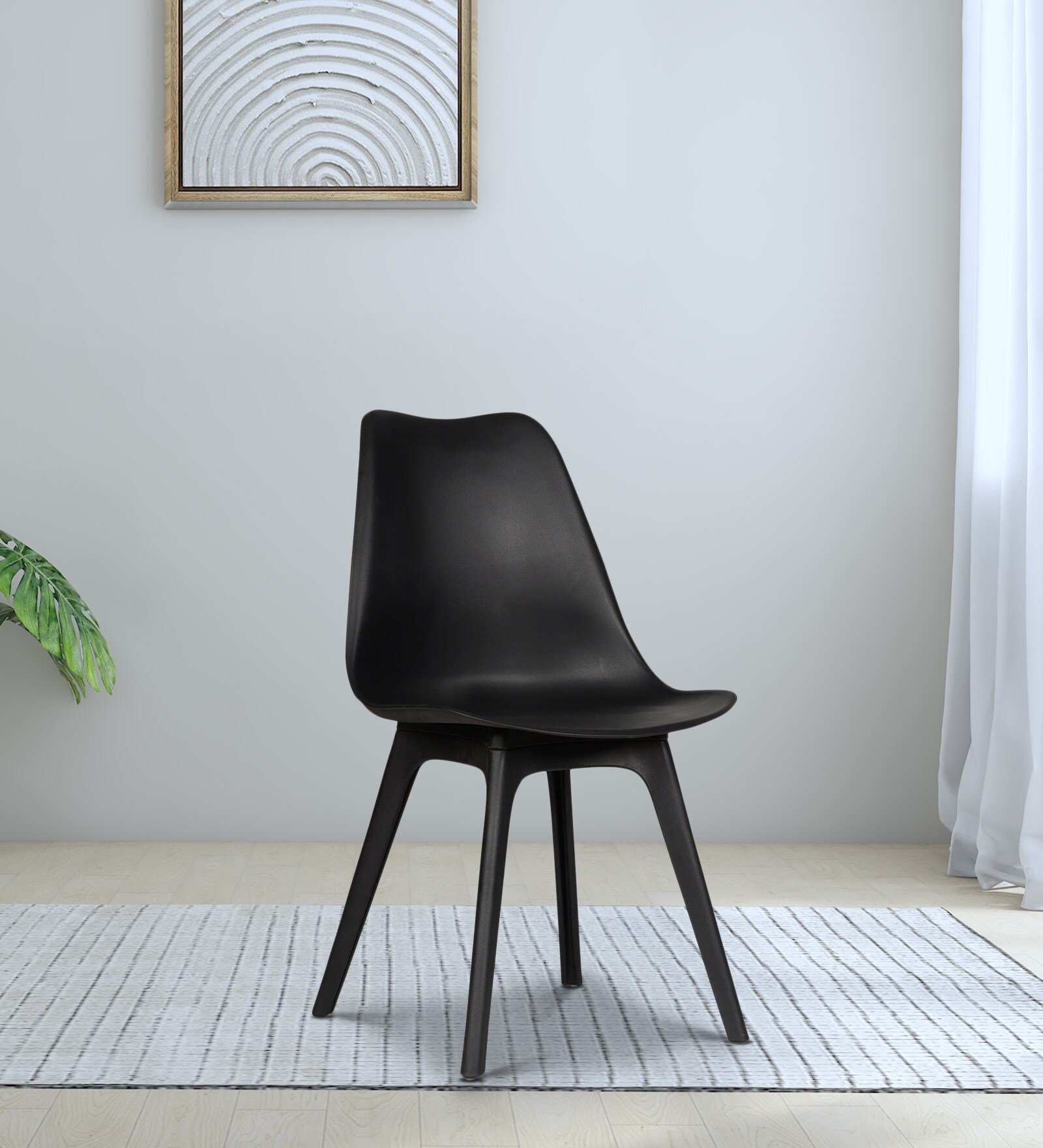 Simson Plastic Iconic Chair in Black Colour