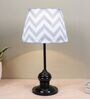 Sleek Spark Black Metal Table Lamp With Maze Print Satin Shade