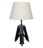 Small Black Tripod Table Lamp With Tapered Beige Lampshade