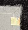 Black Shaggy Polyester 6 ft x 9 ft Machine Made Carpet