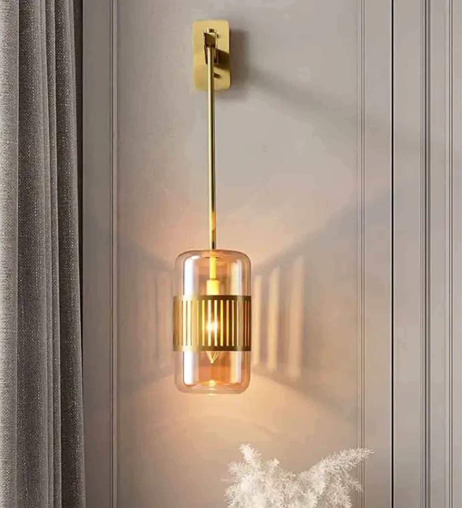 Stello Contemporary Wall Light   Gold Finish with Amber Glass Shade