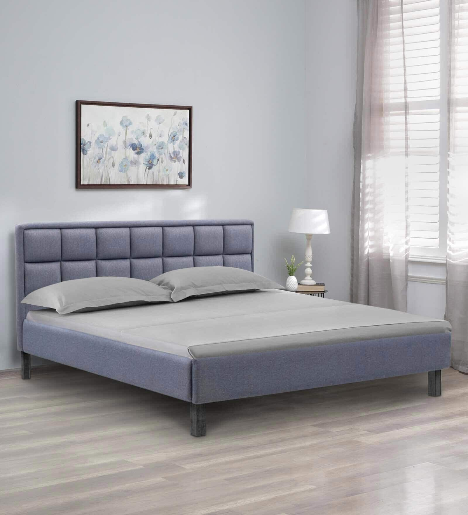 Buy Surma Upholstered King Size Bed In Omega Blue Finish at 25% OFF by ...