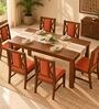 Tarang 6 Seater Dining Set In Provincial Teak Finish With Terracotta Orange Colour Chair Tarang 6 Seater Dining Set In Provincial Teak Finish With Terracotta Orange Colour Chair