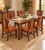 Tarang 6 Seater Dining Set In Provincial Teak Finish With Terracotta Orange Colour Chair Tarang 6 Seater Dining Set In Provincial Teak Finish With Terracotta Orange Colour Chair