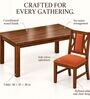 Tarang 6 Seater Dining Set In Provincial Teak Finish With Terracotta Orange Colour Chair Tarang 6 Seater Dining Set In Provincial Teak Finish With Terracotta Orange Colour Chair