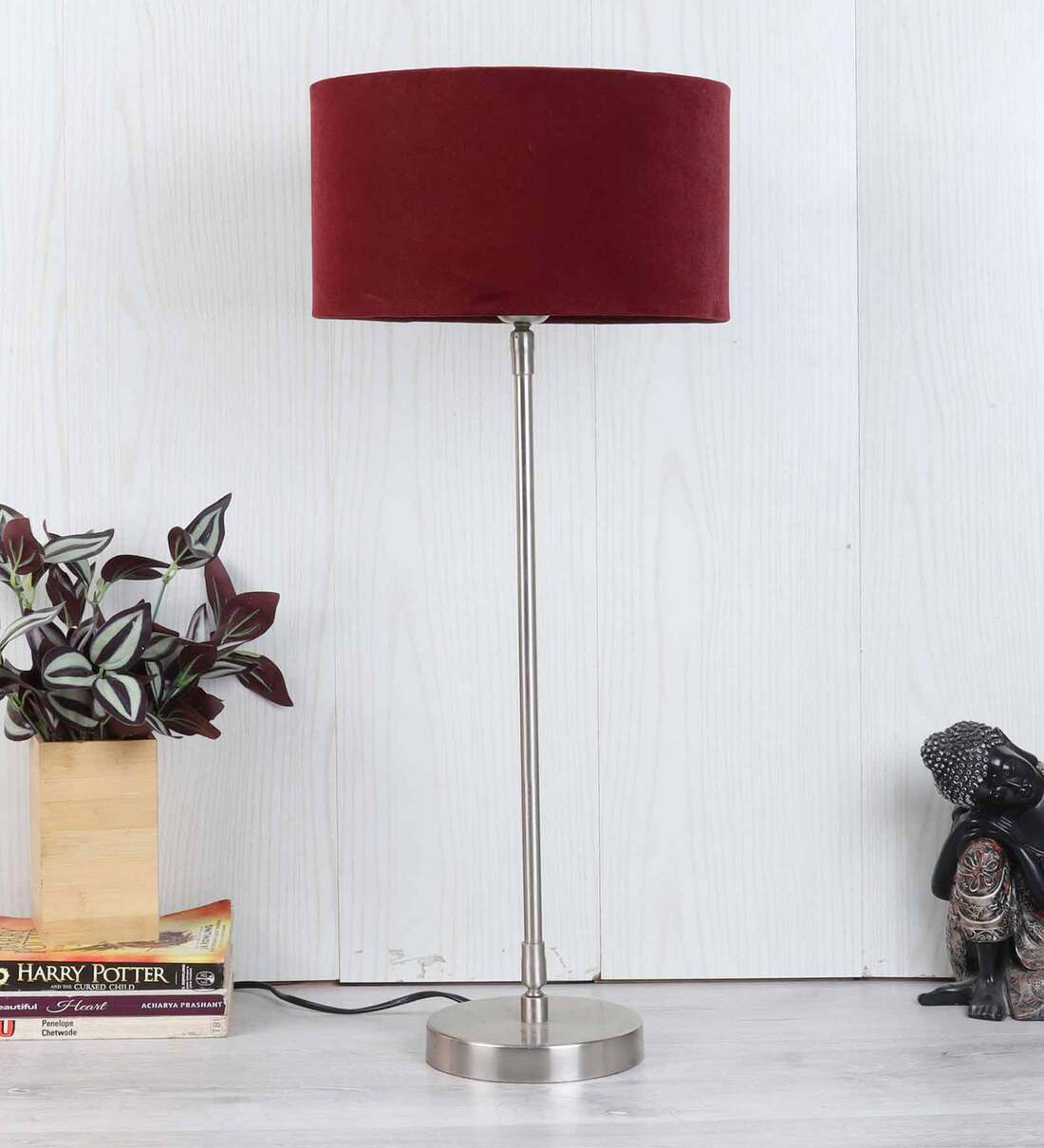 silver lamp with red shade