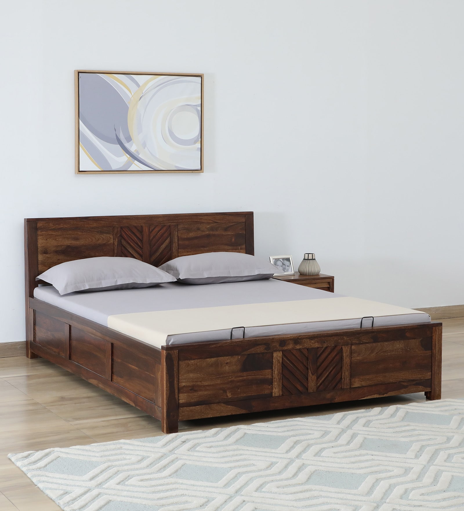 Tourconing Sheesham Wood Queen Size Bed In Provincial Teak Finish With Hydraulic Storage