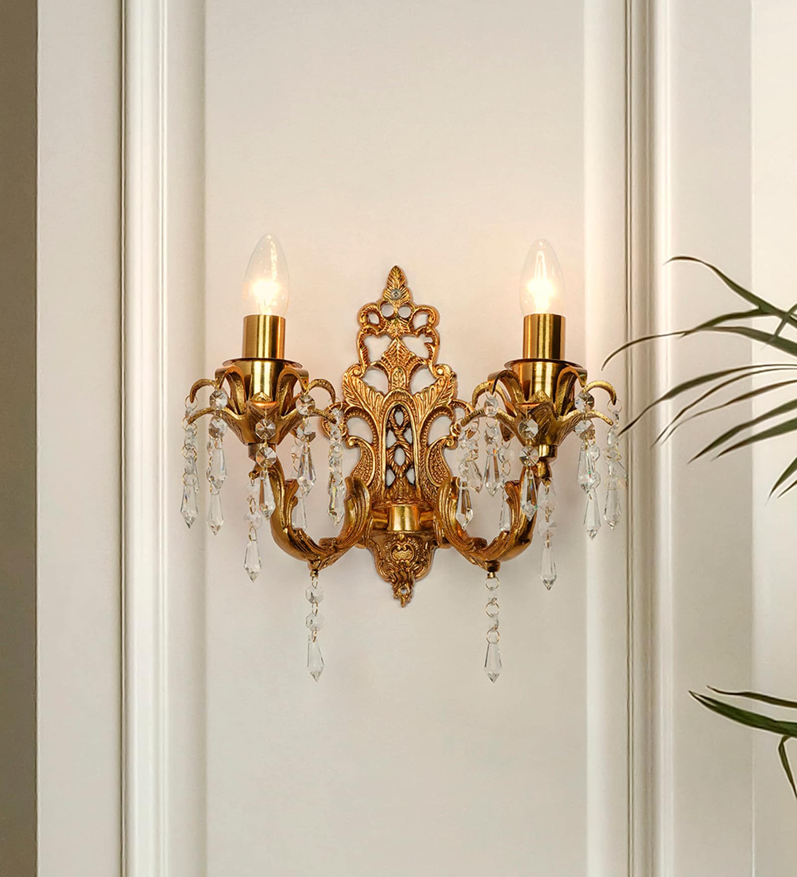 Traditional Brass Candelabra Wall Sconce with Intricate Carving and Pencil Crystals