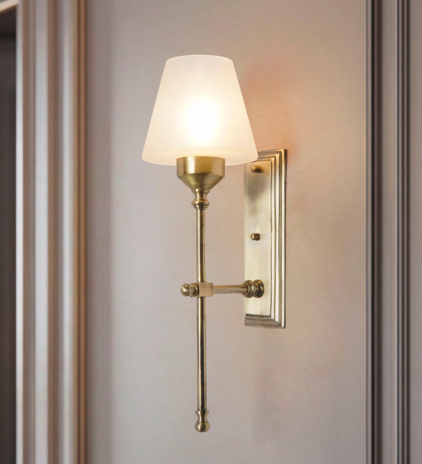Transitional Antique Brass Long Wall Sconce with Frosted Tapered Glass Shade
